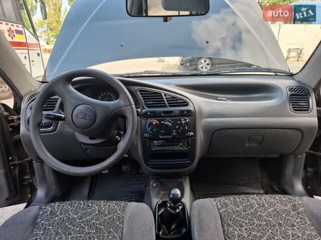 Черный Дэу Ланос, объемом двигателя 1.5 л и пробегом 234 тыс. км за 2900 $, фото 29 на Automoto.ua