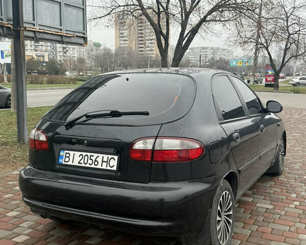 Черный Дэу Ланос, объемом двигателя 1.6 л и пробегом 181 тыс. км за 2350 $, фото 4 на Automoto.ua