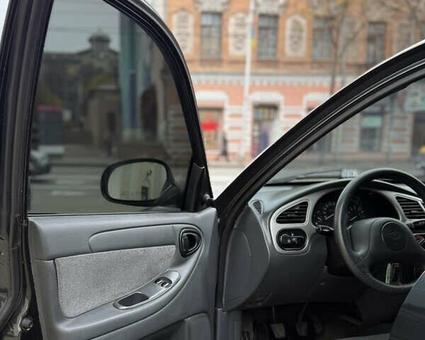 Черный Дэу Ланос, объемом двигателя 1.6 л и пробегом 190 тыс. км за 2650 $, фото 9 на Automoto.ua