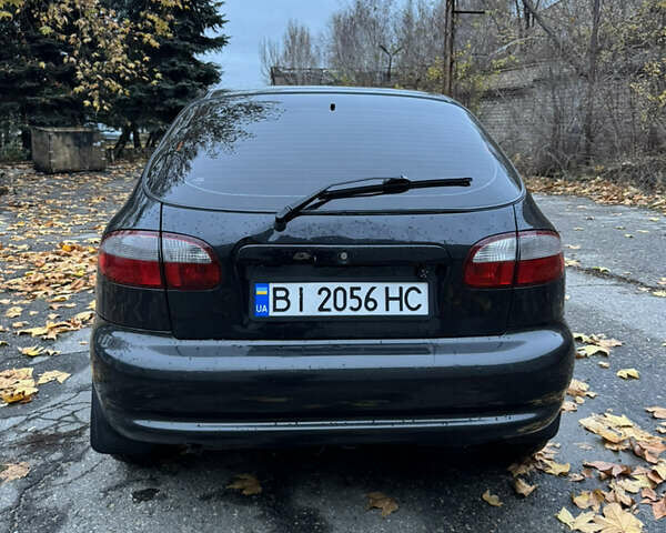 Чорний Деу Ланос, об'ємом двигуна 1.6 л та пробігом 190 тис. км за 2350 $, фото 4 на Automoto.ua