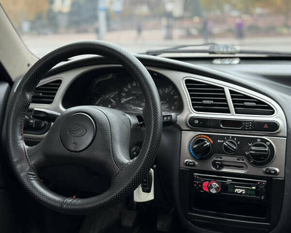 Черный Дэу Ланос, объемом двигателя 1.6 л и пробегом 190 тыс. км за 2650 $, фото 10 на Automoto.ua