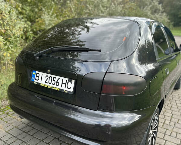 Черный Дэу Ланос, объемом двигателя 1.6 л и пробегом 177 тыс. км за 2799 $, фото 1 на Automoto.ua