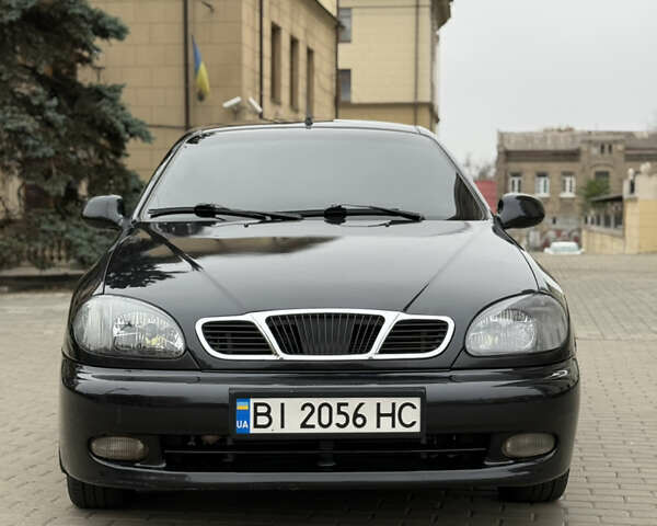 Черный Дэу Ланос, объемом двигателя 1.6 л и пробегом 190 тыс. км за 2650 $, фото 2 на Automoto.ua