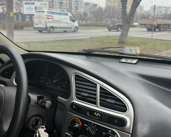 Черный Дэу Ланос, объемом двигателя 1.6 л и пробегом 181 тыс. км за 2350 $, фото 7 на Automoto.ua