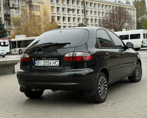 Черный Дэу Ланос, объемом двигателя 1.6 л и пробегом 190 тыс. км за 2650 $, фото 4 на Automoto.ua