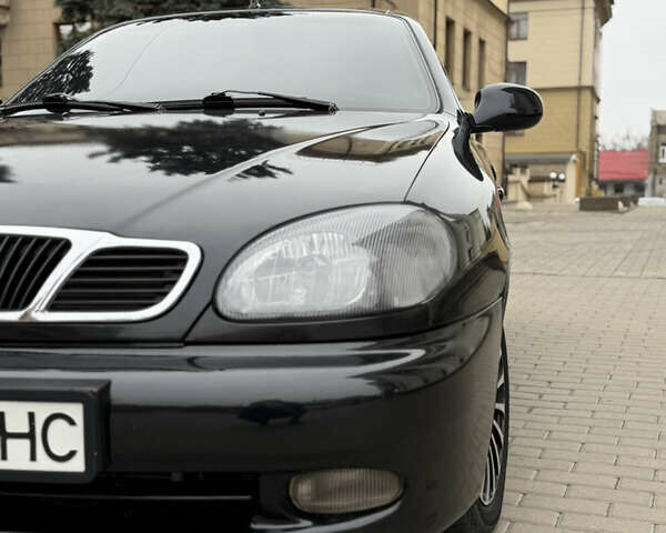 Черный Дэу Ланос, объемом двигателя 1.6 л и пробегом 190 тыс. км за 2650 $, фото 3 на Automoto.ua