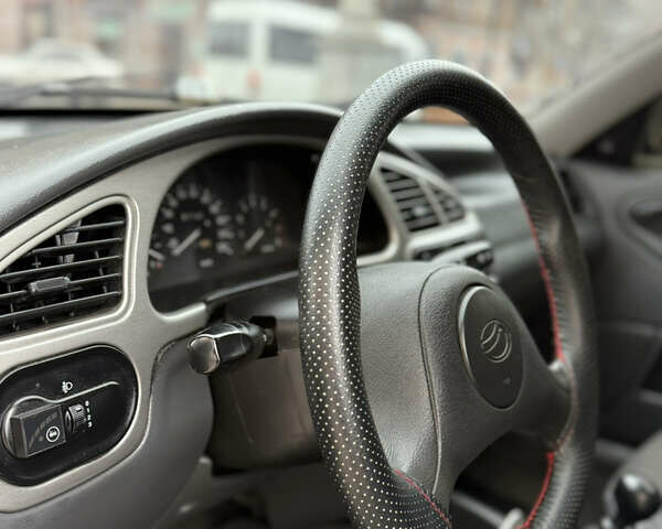 Чорний Деу Ланос, об'ємом двигуна 1.6 л та пробігом 190 тис. км за 2350 $, фото 8 на Automoto.ua