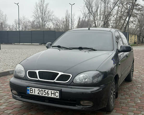 Черный Дэу Ланос, объемом двигателя 1.6 л и пробегом 181 тыс. км за 2350 $, фото 2 на Automoto.ua