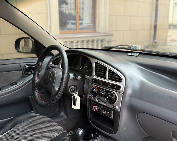 Деу Ланос 2009 у Запоріжжя на Automoto.ua Чорний Деу Ланос, об'ємом двигуна 1.6 л та пробігом 180 тис. км за 2650 $, фото 7 на Automoto.ua