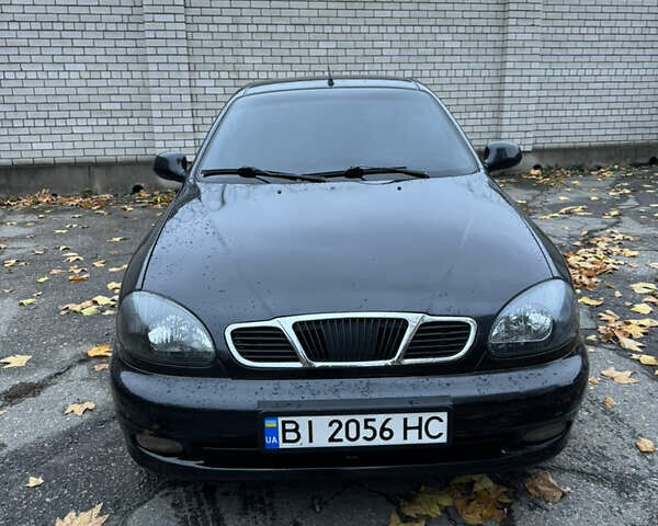 Чорний Деу Ланос, об'ємом двигуна 1.6 л та пробігом 190 тис. км за 2350 $, фото 1 на Automoto.ua