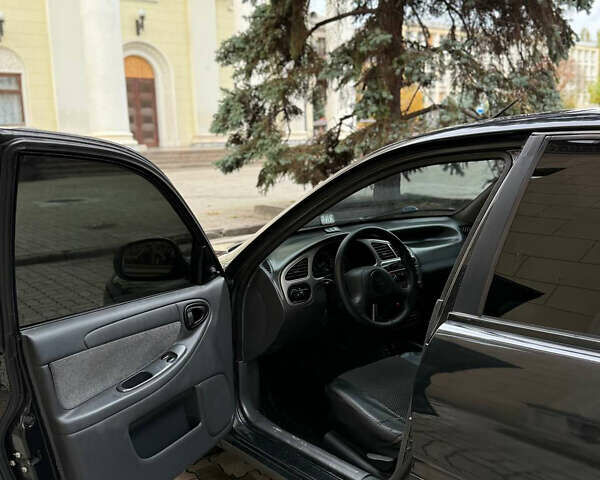 Деу Ланос 2009 у Запоріжжя на Automoto.ua Чорний Деу Ланос, об'ємом двигуна 1.6 л та пробігом 180 тис. км за 2650 $, фото 3 на Automoto.ua