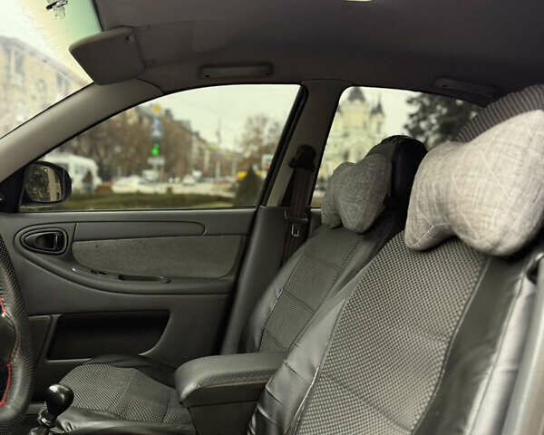 Чорний Деу Ланос, об'ємом двигуна 1.6 л та пробігом 190 тис. км за 2350 $, фото 9 на Automoto.ua