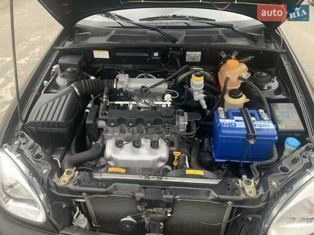 Черный Дэу Ланос, объемом двигателя 1.5 л и пробегом 96 тыс. км за 2750 $, фото 22 на Automoto.ua