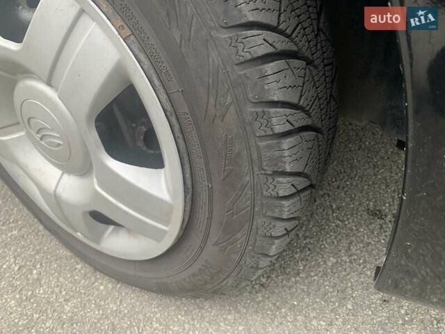 Черный Дэу Ланос, объемом двигателя 1.5 л и пробегом 96 тыс. км за 2750 $, фото 20 на Automoto.ua