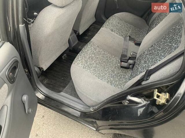 Черный Дэу Ланос, объемом двигателя 1.5 л и пробегом 96 тыс. км за 2700 $, фото 6 на Automoto.ua