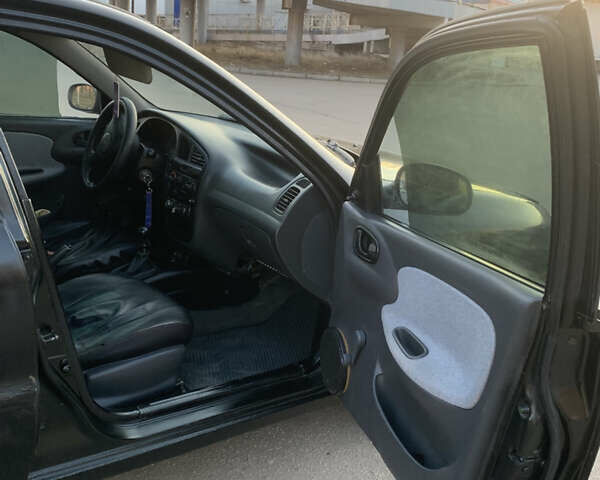 Чорний Деу Ланос, об'ємом двигуна 1.5 л та пробігом 200 тис. км за 1200 $, фото 13 на Automoto.ua