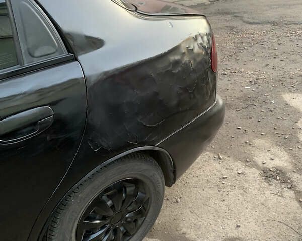 Чорний Деу Ланос, об'ємом двигуна 1.5 л та пробігом 200 тис. км за 1200 $, фото 7 на Automoto.ua