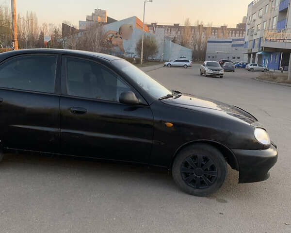 Чорний Деу Ланос, об'ємом двигуна 1.5 л та пробігом 200 тис. км за 1200 $, фото 6 на Automoto.ua