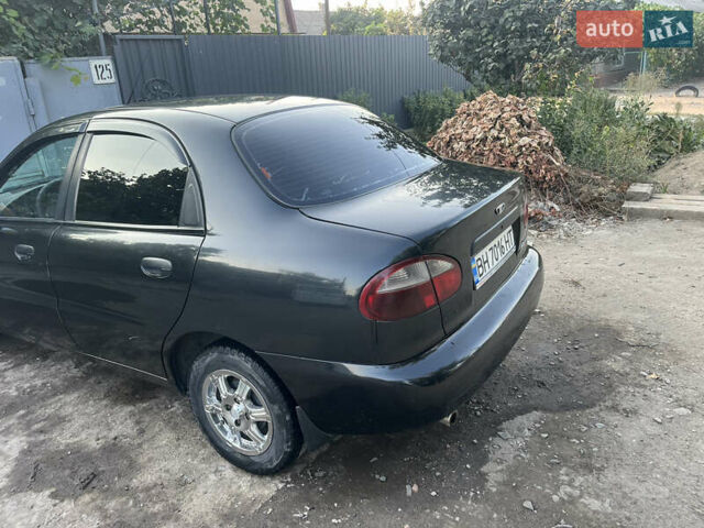 Черный Дэу Ланос, объемом двигателя 1.5 л и пробегом 160 тыс. км за 2800 $, фото 4 на Automoto.ua
