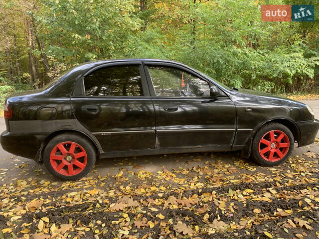 Черный Дэу Ланос, объемом двигателя 1.5 л и пробегом 290 тыс. км за 1600 $, фото 6 на Automoto.ua