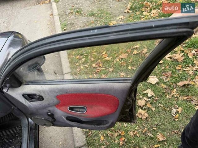 Черный Дэу Ланос, объемом двигателя 1.5 л и пробегом 100 тыс. км за 900 $, фото 7 на Automoto.ua