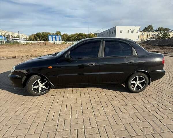 Черный Дэу Ланос, объемом двигателя 1.5 л и пробегом 163 тыс. км за 2900 $, фото 27 на Automoto.ua