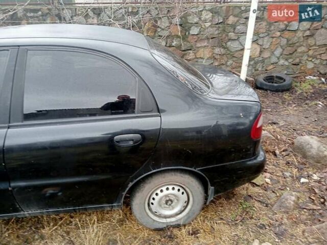 Чорний Деу Ланос, об'ємом двигуна 1.5 л та пробігом 186 тис. км за 900 $, фото 1 на Automoto.ua
