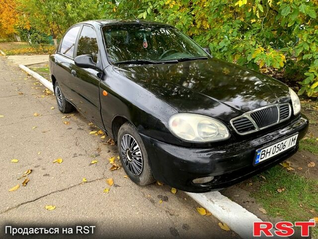 Черный Дэу Ланос, объемом двигателя 1.5 л и пробегом 256 тыс. км за 2600 $, фото 5 на Automoto.ua