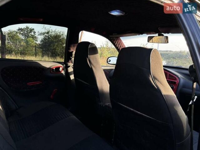 Черный Дэу Ланос, объемом двигателя 1.5 л и пробегом 328 тыс. км за 1299 $, фото 9 на Automoto.ua