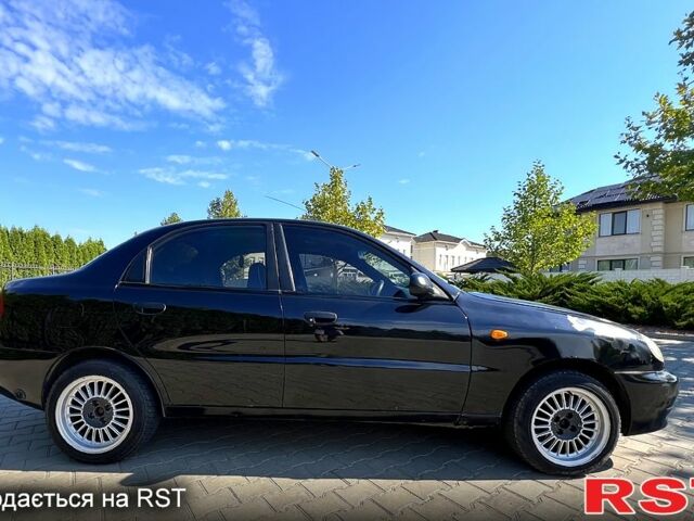 Черный Дэу Ланос, объемом двигателя 1.5 л и пробегом 183 тыс. км за 2600 $, фото 2 на Automoto.ua