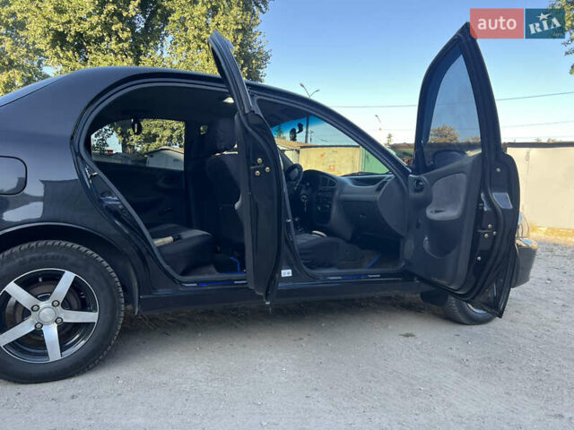 Чорний Деу Ланос, об'ємом двигуна 1.5 л та пробігом 134 тис. км за 4000 $, фото 7 на Automoto.ua