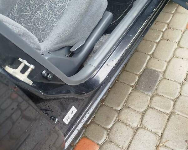 Черный Дэу Ланос, объемом двигателя 1.5 л и пробегом 200 тыс. км за 2150 $, фото 5 на Automoto.ua