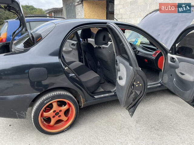 Чорний Деу Ланос, об'ємом двигуна 1.5 л та пробігом 130 тис. км за 2700 $, фото 5 на Automoto.ua