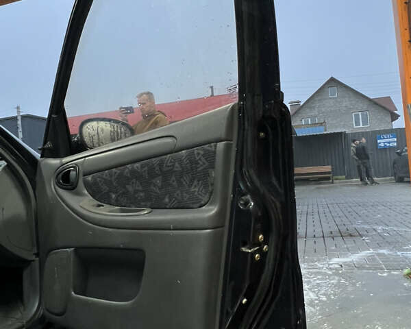 Черный Дэу Ланос, объемом двигателя 1.5 л и пробегом 145 тыс. км за 1799 $, фото 9 на Automoto.ua