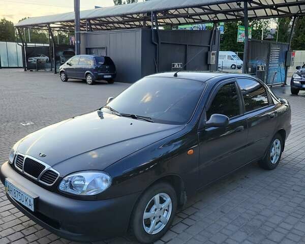 Черный Дэу Ланос, объемом двигателя 1.5 л и пробегом 215 тыс. км за 2900 $, фото 2 на Automoto.ua