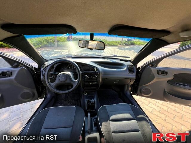 Черный Дэу Ланос, объемом двигателя 1.5 л и пробегом 183 тыс. км за 2600 $, фото 6 на Automoto.ua