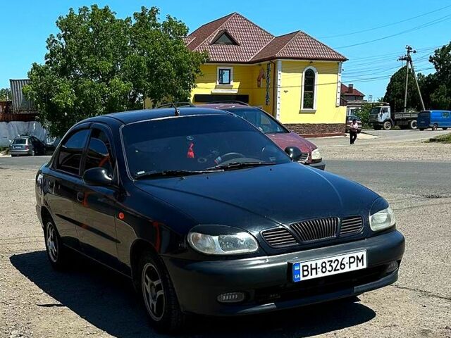 Черный Дэу Ланос, объемом двигателя 1.5 л и пробегом 123 тыс. км за 2200 $, фото 5 на Automoto.ua