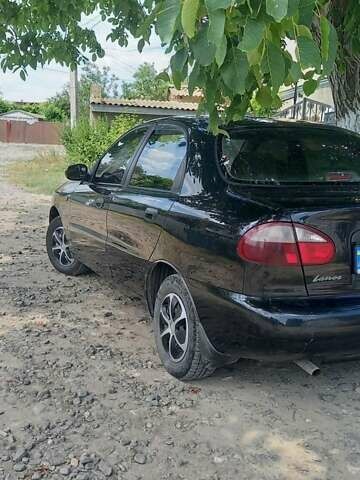 Черный Дэу Ланос, объемом двигателя 1.5 л и пробегом 328 тыс. км за 2700 $, фото 4 на Automoto.ua