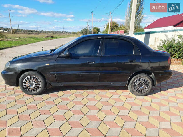 Черный Дэу Ланос, объемом двигателя 1.5 л и пробегом 226 тыс. км за 1450 $, фото 6 на Automoto.ua