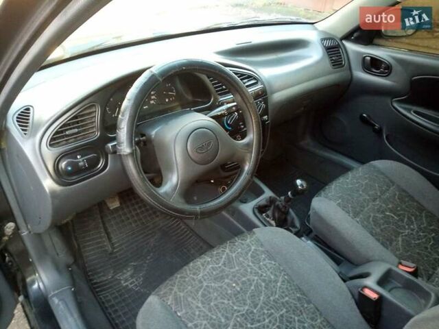 Черный Дэу Ланос, объемом двигателя 1.5 л и пробегом 231 тыс. км за 1999 $, фото 8 на Automoto.ua