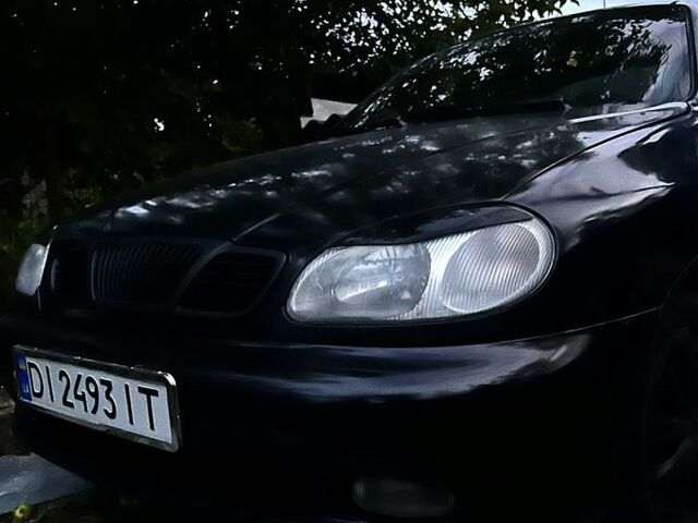 Черный Дэу Ланос, объемом двигателя 1.5 л и пробегом 274 тыс. км за 2000 $, фото 1 на Automoto.ua