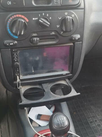 Черный Дэу Ланос, объемом двигателя 1.5 л и пробегом 147 тыс. км за 1800 $, фото 7 на Automoto.ua