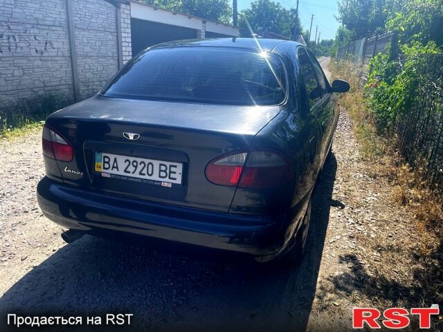 Черный Дэу Ланос, объемом двигателя 1.5 л и пробегом 200 тыс. км за 2000 $, фото 2 на Automoto.ua