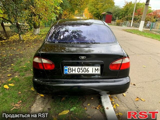 Черный Дэу Ланос, объемом двигателя 1.5 л и пробегом 256 тыс. км за 2600 $, фото 3 на Automoto.ua