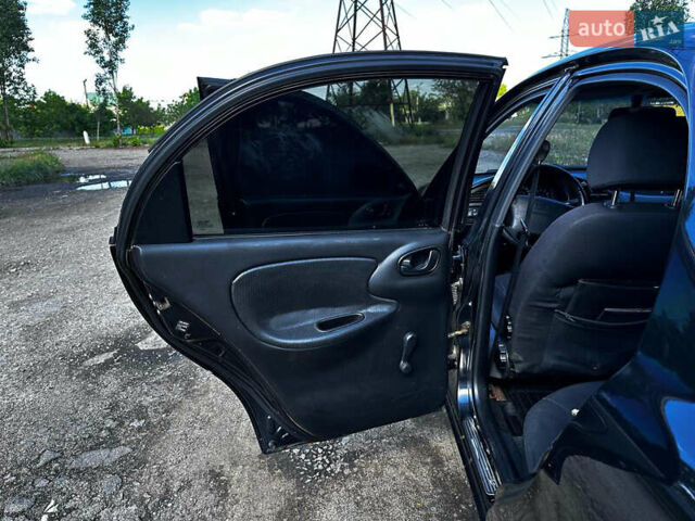 Черный Дэу Ланос, объемом двигателя 1.5 л и пробегом 220 тыс. км за 3100 $, фото 16 на Automoto.ua