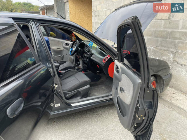 Чорний Деу Ланос, об'ємом двигуна 1.5 л та пробігом 130 тис. км за 2700 $, фото 7 на Automoto.ua