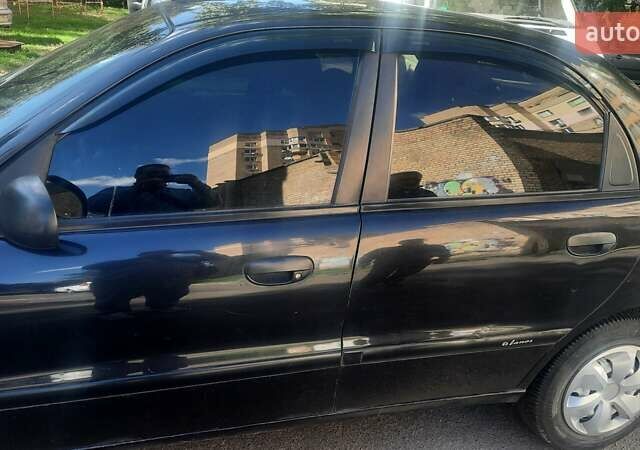 Черный Дэу Ланос, объемом двигателя 1.5 л и пробегом 110 тыс. км за 1500 $, фото 9 на Automoto.ua