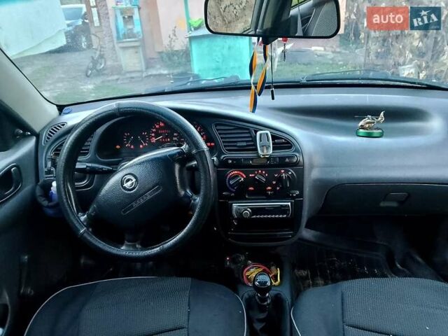 Черный Дэу Ланос, объемом двигателя 1.5 л и пробегом 256 тыс. км за 1850 $, фото 2 на Automoto.ua