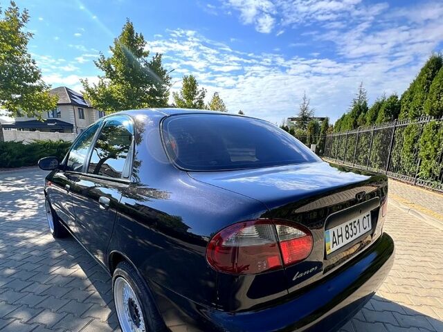 Черный Дэу Ланос, объемом двигателя 1.5 л и пробегом 183 тыс. км за 2600 $, фото 4 на Automoto.ua