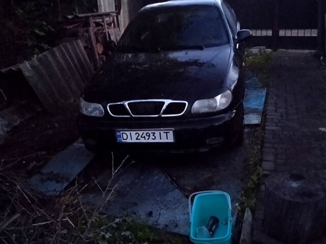 Черный Дэу Ланос, объемом двигателя 1.5 л и пробегом 274 тыс. км за 2000 $, фото 5 на Automoto.ua